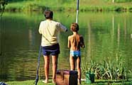 Dad and son spending a day fishing